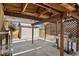 Covered patio area, including a grill, with a shed in the background, and a privacy lattice at 1655 S Quintero Way, Aurora, CO 80017