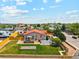 Aerial view of a property featuring a large yard, a deck, and a rock garden feature at 3595 W 67Th S Ave, Denver, CO 80221
