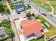 Aerial view showcasing a well-maintained property with a spacious yard and a long driveway at 3595 W 67Th S Ave, Denver, CO 80221