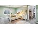 Spacious bedroom with a large window, carpet, and plenty of closet storage space at 3595 W 67Th S Ave, Denver, CO 80221