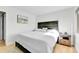 Bright bedroom with wood floors and a comfortable bed at 7973 Chase Circle # 54, Arvada, CO 80003