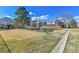 Community playground with a slide and grassy area for to play at 7973 Chase Circle # 54, Arvada, CO 80003