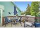 Relaxing deck with outdoor seating, perfect for enjoying the outdoors in this lovely home at 5843 Ceylon St, Denver, CO 80249