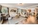 Bright and airy living room with an open floor plan and neutral decor at 5843 Ceylon St, Denver, CO 80249