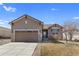 Attractive single-story home with a two-car garage and meticulous landscaping at 4561 Hope Cir, Broomfield, CO 80023