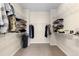 Spacious walk-in closet with built-in shelving and ample storage space at 4561 Hope Cir, Broomfield, CO 80023