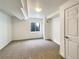 Finished basement bedroom with window and carpet at 2020 Alpine Dr, Erie, CO 80516