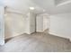 Spacious basement bedroom with neutral carpeting and ample closet space at 2020 Alpine Dr, Erie, CO 80516