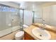 Clean bathroom with tub/shower combo and updated vanity at 2020 Alpine Dr, Erie, CO 80516