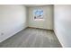 Cozy carpeted bedroom with a window offering a view at 2020 Alpine Dr, Erie, CO 80516