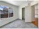 Spacious bedroom with double-door closet and window at 2020 Alpine Dr, Erie, CO 80516