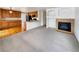 Living room with fireplace and kitchen with island at 2020 Alpine Dr, Erie, CO 80516