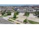 Aerial view showcases a Gathering friendly community with nicely manicured lawns at 4858 S Tibet St, Aurora, CO 80015