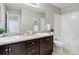 Bathroom featuring double sinks and shower/tub combo at 4858 S Tibet St, Aurora, CO 80015