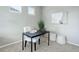 Minimalist office with desk, chair, and neutral tones for a serene workspace at 4858 S Tibet St, Aurora, CO 80015
