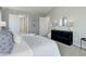 Neutral bedroom showcasing decor, furnishings, and multiple doorways at 4858 S Tibet St, Aurora, CO 80015