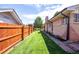 Spacious backyard with a lush green lawn, perfect for outdoor activities and relaxation at 4585 Hooker St, Denver, CO 80211
