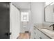 Updated bathroom with granite countertop, modern fixtures and bath with shower at 4585 Hooker St, Denver, CO 80211