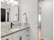 Modern bathroom featuring granite countertop, modern fixtures and updated lighting at 4585 Hooker St, Denver, CO 80211