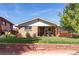 Charming single-story home with brick facade, well-kept lawn, and inviting front porch at 4585 Hooker St, Denver, CO 80211