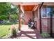 Charming front porch area with comfortable seating, offering a welcoming outdoor space at 4585 Hooker St, Denver, CO 80211