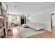 Bright living room with fireplace, hardwood floors and large windows, a cozy gathering space at 4585 Hooker St, Denver, CO 80211