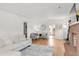 Open living room featuring hardwood floors, stylish decor and bright natural light at 4585 Hooker St, Denver, CO 80211