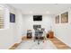 Brightly lit office area with modern chair, luxury vinyl plank flooring and natural light at 4585 Hooker St, Denver, CO 80211