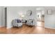 Cozy sitting area with comfortable chairs, stylish decor, and hardwood floors, great for relaxing at 4585 Hooker St, Denver, CO 80211