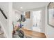 Workout room featuring modern exercise bike with doorway view to bathroom with shower at 4585 Hooker St, Denver, CO 80211