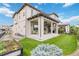 Spacious backyard with a covered patio, perfect for outdoor entertaining and relaxation at 9724 Cantabria Pt, Lone Tree, CO 80124