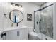 Stylish bathroom showcases a walk-in shower, updated vanity, and modern accents at 9724 Cantabria Pt, Lone Tree, CO 80124