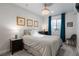 Charming bedroom offers soft lighting, plush carpet and a cozy atmosphere at 9724 Cantabria Pt, Lone Tree, CO 80124