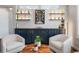 Relaxing living room with comfortable seating, a wine rack, and a modern design at 9724 Cantabria Pt, Lone Tree, CO 80124