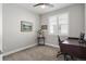 Cozy office space with natural light, desk, and chair at 9724 Cantabria Pt, Lone Tree, CO 80124