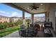 Outdoor patio offers ample seating, lush greenery, and scenic views at 9724 Cantabria Pt, Lone Tree, CO 80124