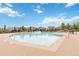 Inviting community pool with lounge chairs and tables, set against a backdrop of neighborhood homes at 9724 Cantabria Pt, Lone Tree, CO 80124