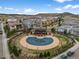 Community pool with an elegant pergola, surrounded by well-manicured landscaping in a neighborhood at 9724 Cantabria Pt, Lone Tree, CO 80124