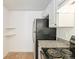Bright kitchen featuring modern stainless steel refrigerator, range, and light-colored cabinetry at 2880 S Locust St # 109S, Denver, CO 80222