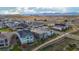 A stunning aerial view of a residential community with mountain views and walking trail at 8726 Holman Cir, Arvada, CO 80005