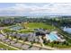 Aerial view of community pool, clubhouse, playground, baseball field, and tennis courts at 8726 Holman Cir, Arvada, CO 80005