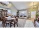 Open-concept living and dining areas filled with natural light at 1542 Cherry St, Brighton, CO 80601