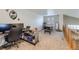 Spacious loft area with neutral carpet, desk, and space for recreation at 1542 Cherry St, Brighton, CO 80601