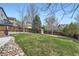 Well maintained backyard featuring a shed, mature trees and a fence at 6530 S Tabor St, Littleton, CO 80127