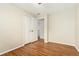Empty bedroom with hardwood floors and closet space at 7333 S Dexter Way, Centennial, CO 80122