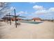 Community pool area with covered picnic tables, providing a great space for residents to relax and socialize at 25064 E Archer Pl, Aurora, CO 80018