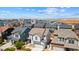Aerial view of a residential neighborhood with modern homes and well-manicured landscaping at 19131 E 65Th Ave, Denver, CO 80249