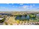 Community lake with walking trails, perfect for neighborhood walks and enjoying outdoor recreation and leisure at 19131 E 65Th Ave, Denver, CO 80249