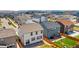 Aerial view showcasing modern homes with well-maintained yards in a planned residential community at 19131 E 65Th Ave, Denver, CO 80249