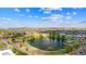 Community lake with walking trails, perfect for neighborhood walks and enjoying outdoor recreation and leisure at 19131 E 65Th Ave, Denver, CO 80249
